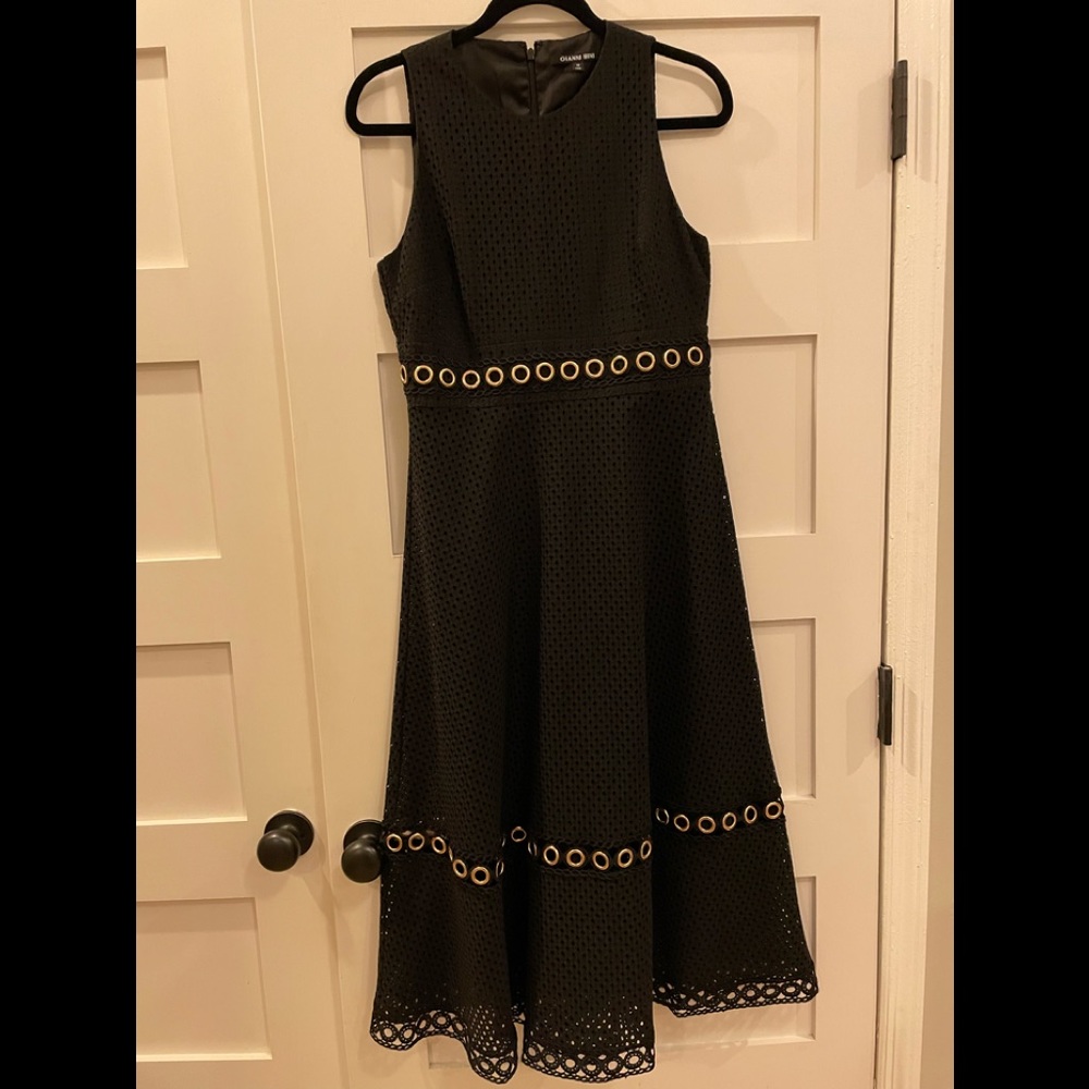 Gianni Bini dress. Black w/gold grommets. Size 10. Worn once! Beautiful dress!